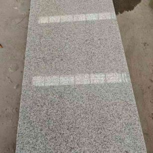 咸阳芝麻白光面毛板